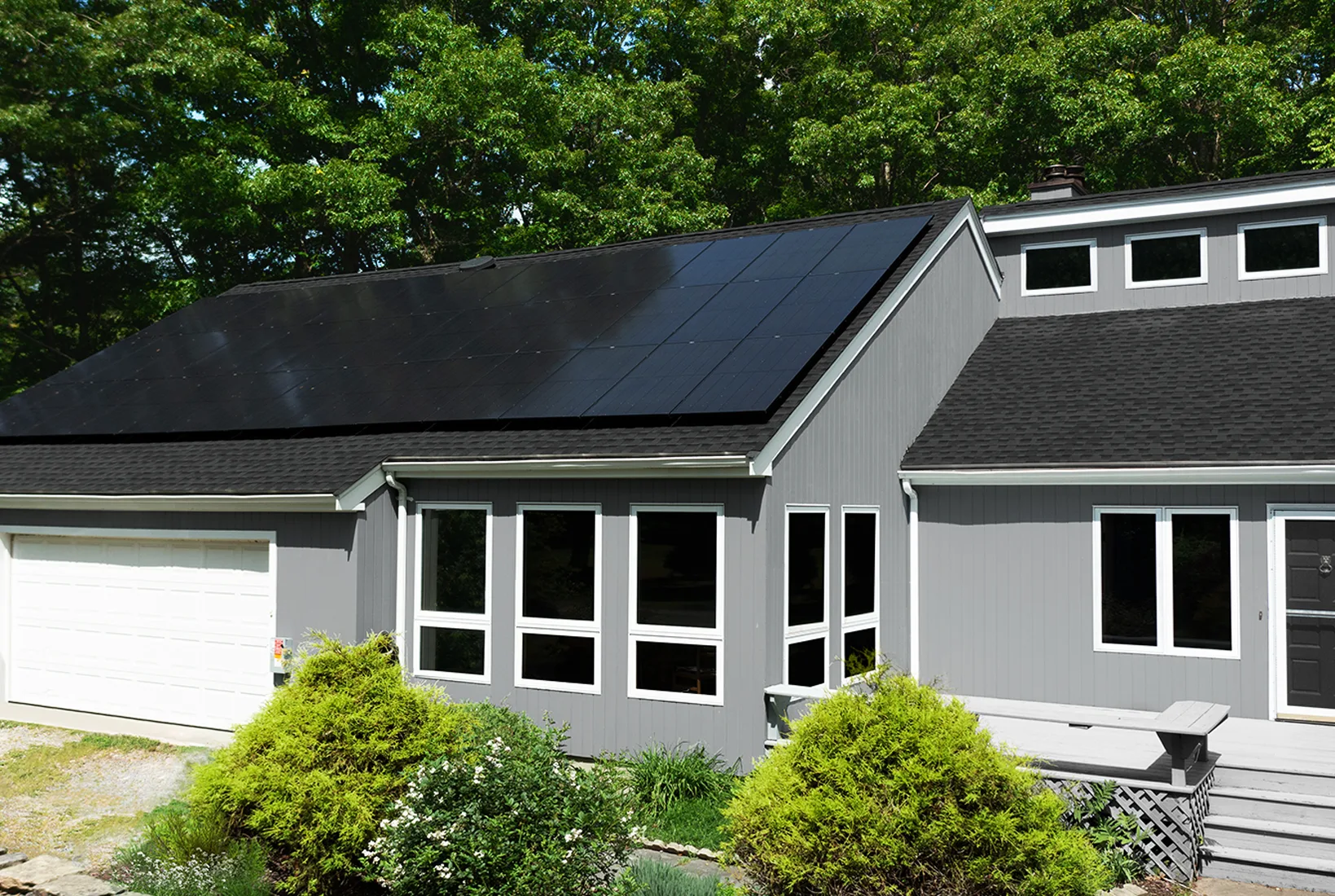 Residential home with solar panels installed by Rooftop Power