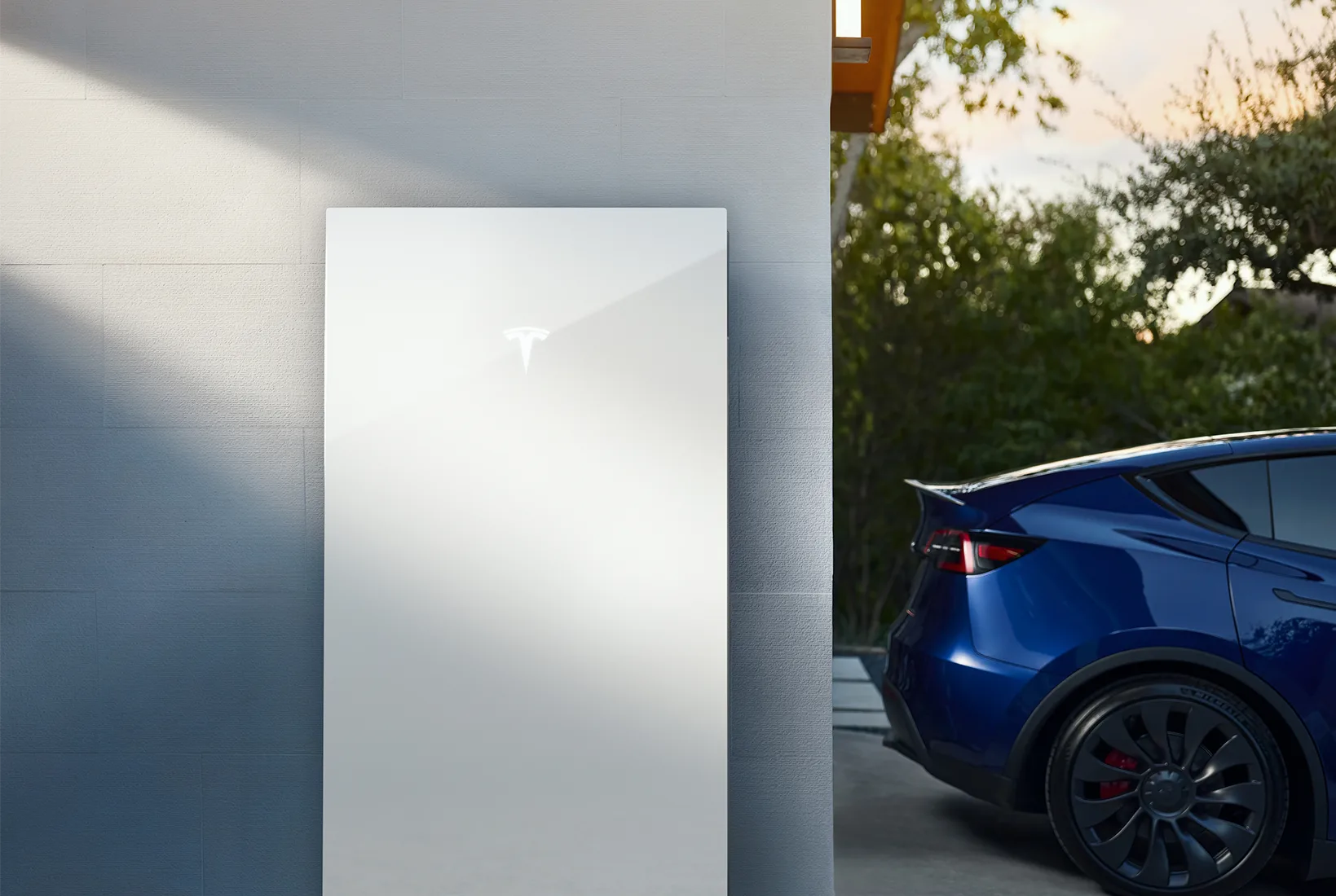Tesla home battery storage system with an EV charger