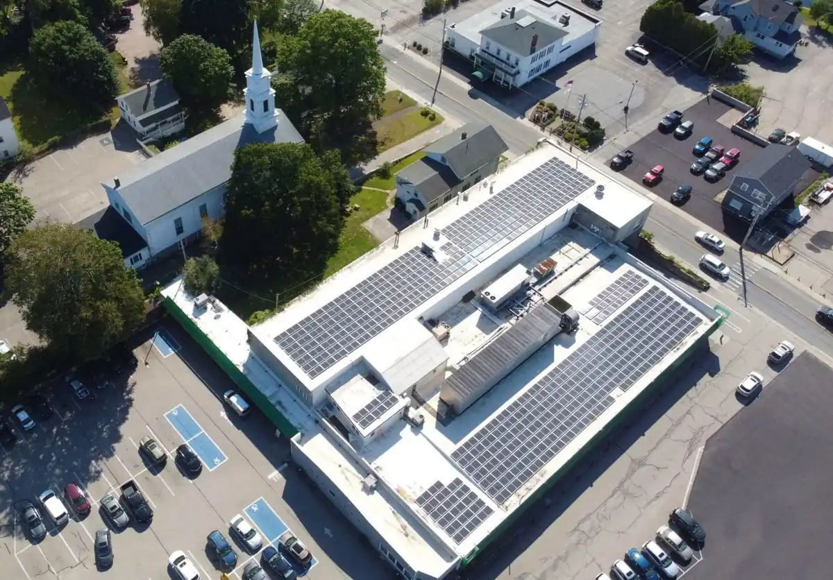 Aerial view of Rooftop Power solar on a grocery store roof