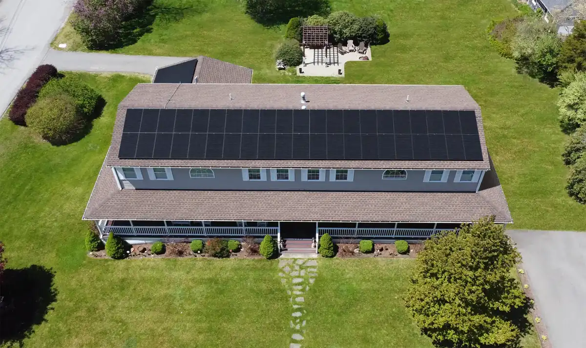 Aerial view of a Rhode Island home with solar panels