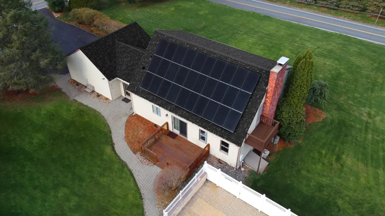 Aerial view of a Rhode Island home solar array in autumn